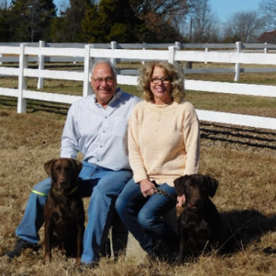 Impella patient Michael Goar with his wife and dogs